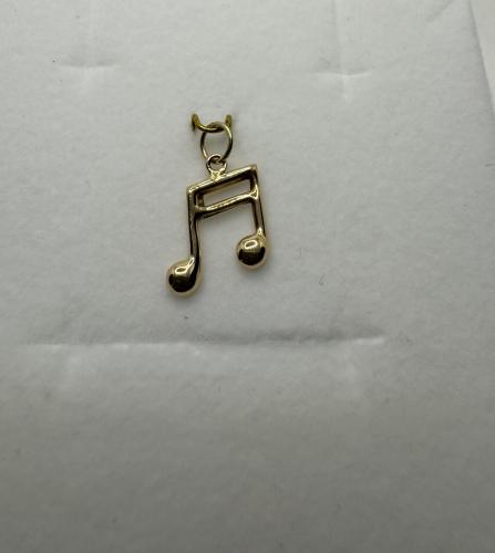 Kultainen maskottiriipus nuotti