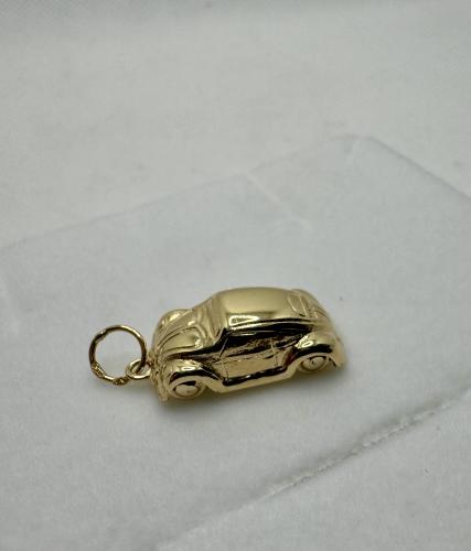 Kultainen maskottiriipus kuplavolkkari