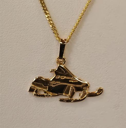 Kultainen maskottiriipus moottorikelkka