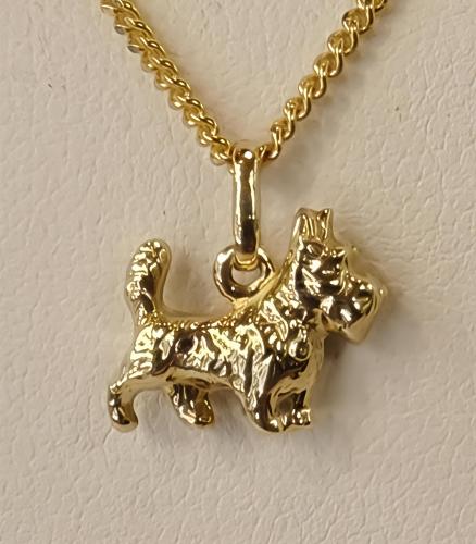 Kultainen terrieri-riipus