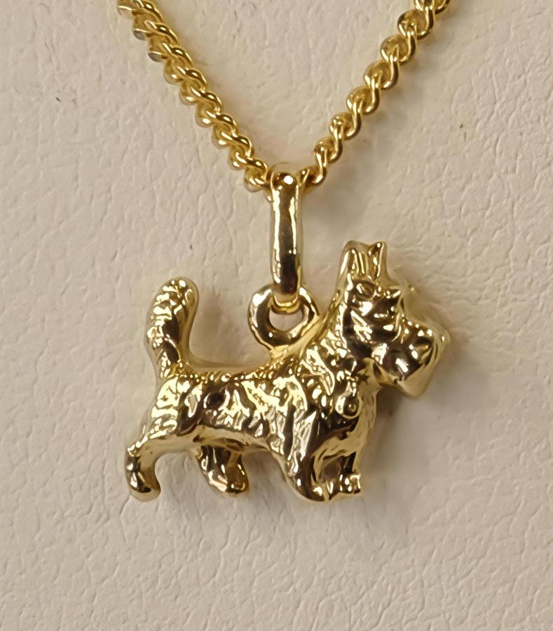 Kultainen terrieri-riipus